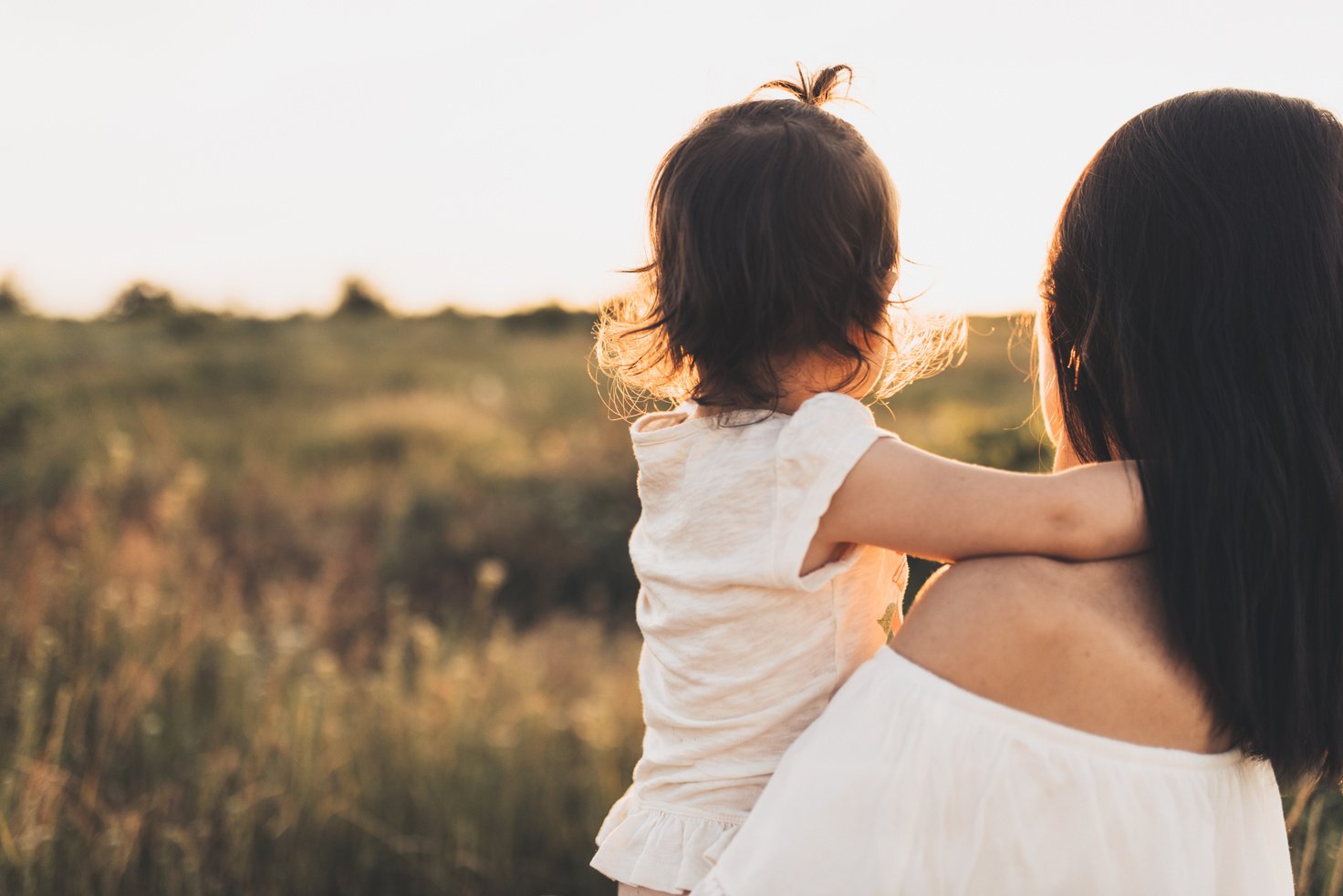 Cropped Rear View of Caucasian Brunette Mother and Child Daughte